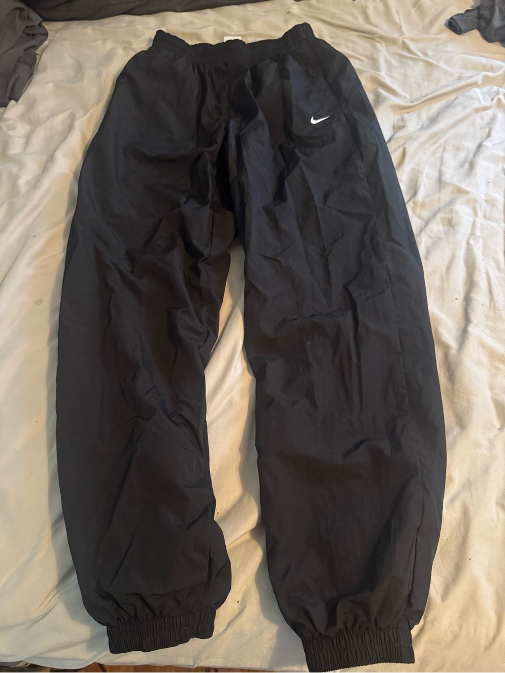 Nike Black Windbreaker Track Pants with White Swoosh